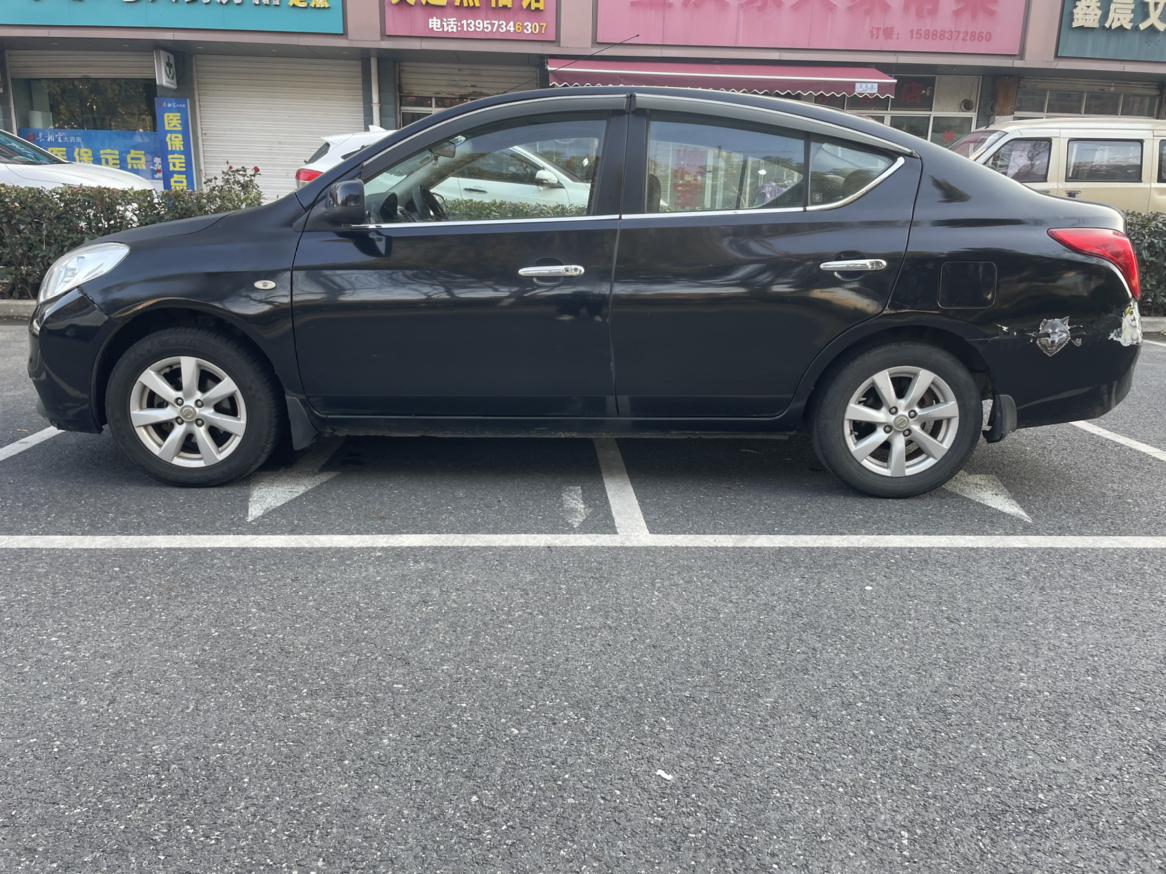Nissan Sunny 2011 thumb 2