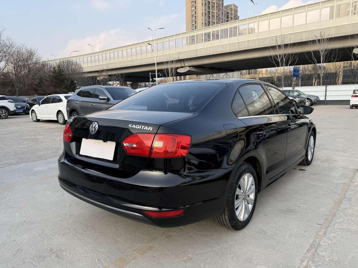 Volkswagen Sagitar 2014 thumb 11