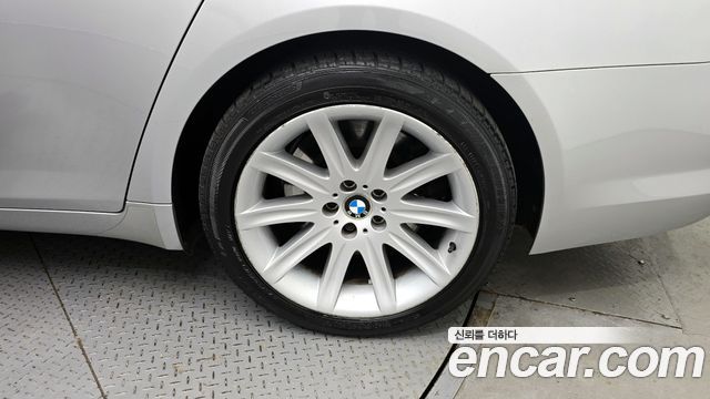 BMW 7 серии 2009 thumb 6
