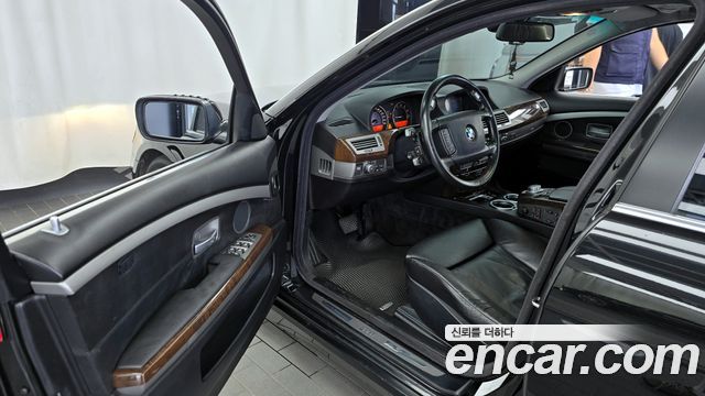 BMW 7 серии 2005 thumb 11