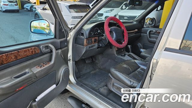 SsangYong Musso 1997 thumb 9