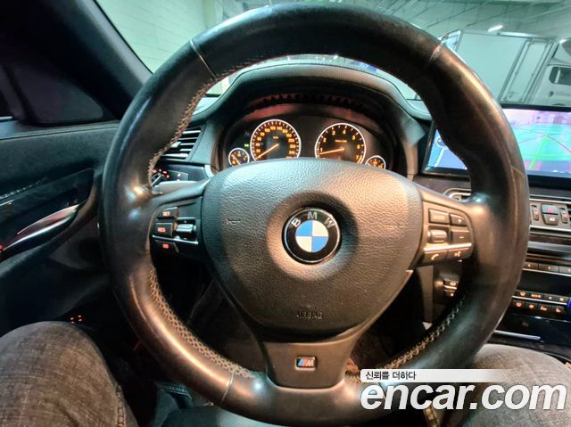 BMW 7 серии 2010 thumb 8
