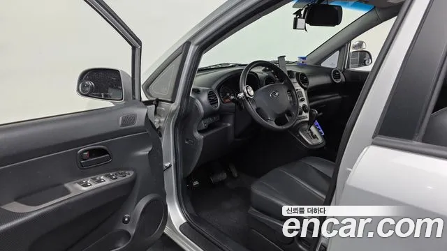 Kia Carens 2009 thumb 12