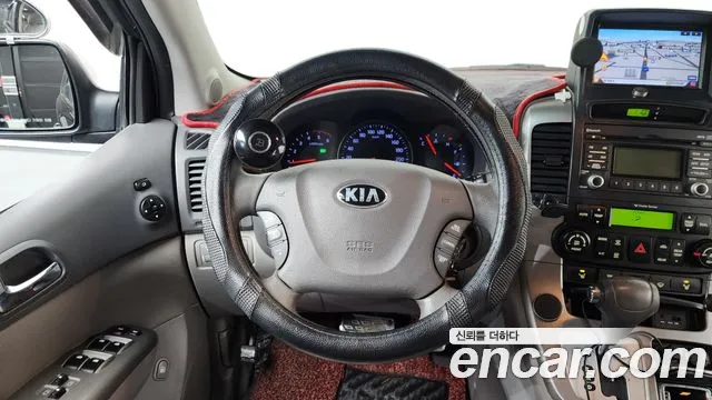 Kia Canival 2012 thumb 12