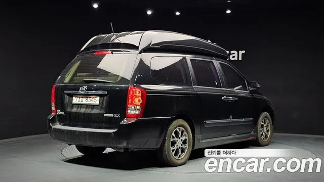 Kia Canival 2013 thumb 11