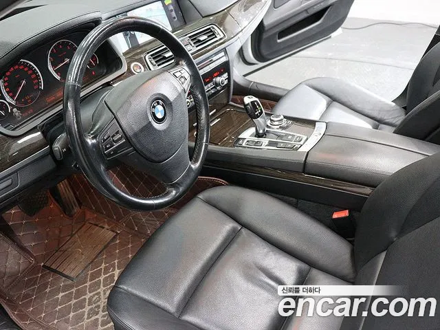 BMW 7 серии 2009 thumb 12