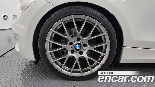 BMW 1 серии 2011 thumb 4