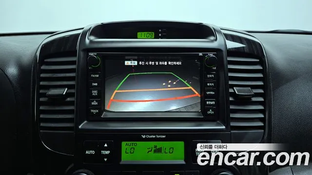 Kia Canival 2010 thumb 12