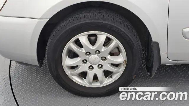 Kia Canival 2011 thumb 3