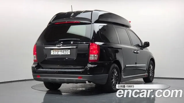 Kia Canival 2010 thumb 2