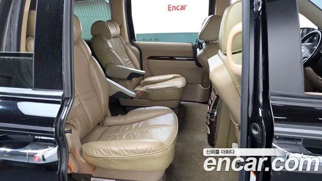 Kia Canival 2010 thumb 11
