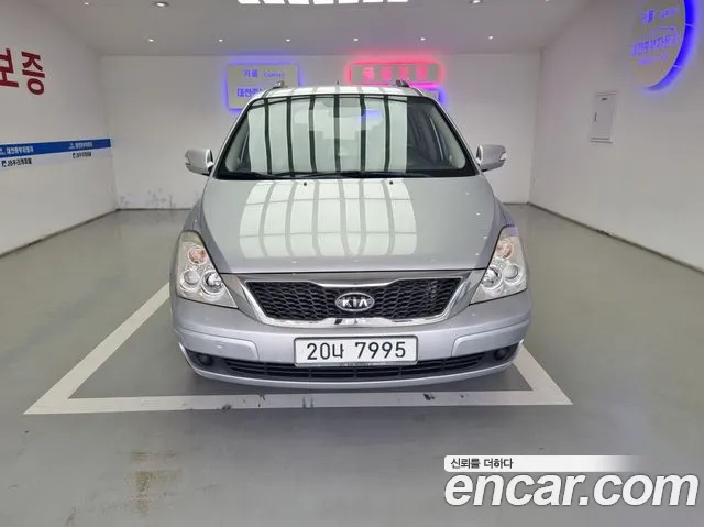 Kia Canival 2010 thumb 12
