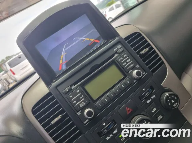 Kia Canival 2010 thumb 5