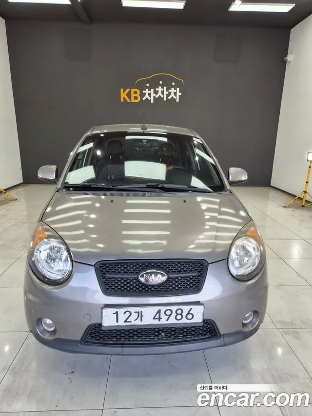 Kia morning 2011 thumb 10