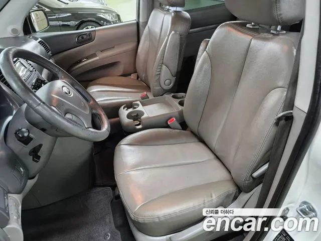 Kia Canival 2012 thumb 2