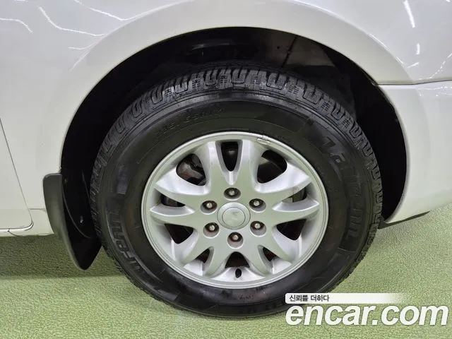 Kia Canival 2012 thumb 11