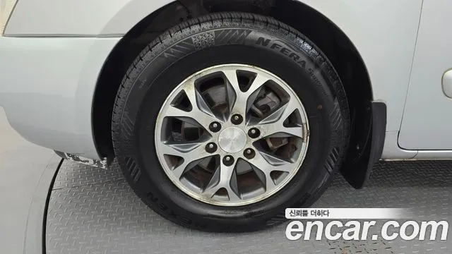 Kia Canival 2014 thumb 7