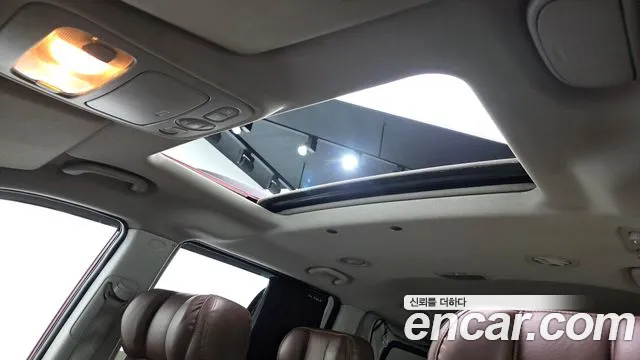 Kia Canival 2012 thumb 11