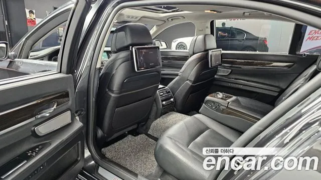 BMW 7 серии 2012 thumb 11