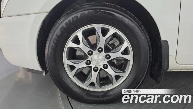 Kia Canival 2013 thumb 12