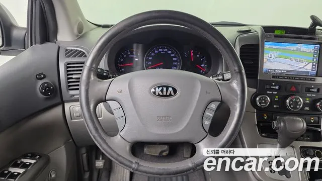 Kia Canival 2013 thumb 11