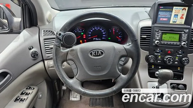 Kia Canival 2012 thumb 12