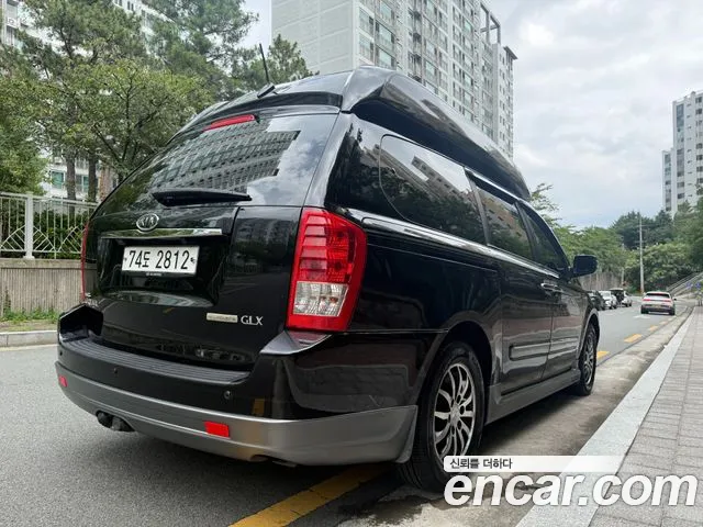 Kia Carnival 2012 thumb 2
