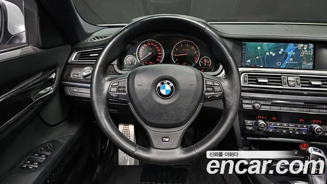 BMW 7-Series 2011 thumb 12
