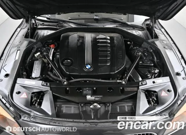 BMW 7-Series 2011 thumb 6