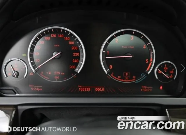 BMW 7-Series 2011 thumb 8